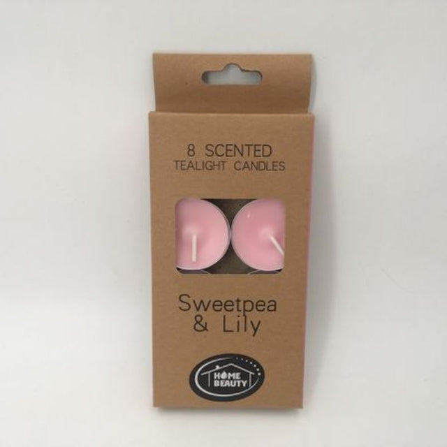Vibrant pink Tealigth candles, 96 pcs, scented with sweetpea and lily for a serene ambiance and relaxation.