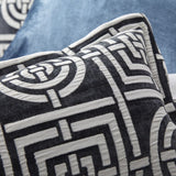 Queen duvet set featuring a striking circles and squares design in charcoal, with plush woven chenille and a stylish silver reverse.