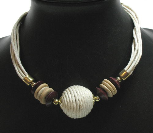 Elegant choker necklace in cream and neutrals, perfect for effortless style on any occasion.