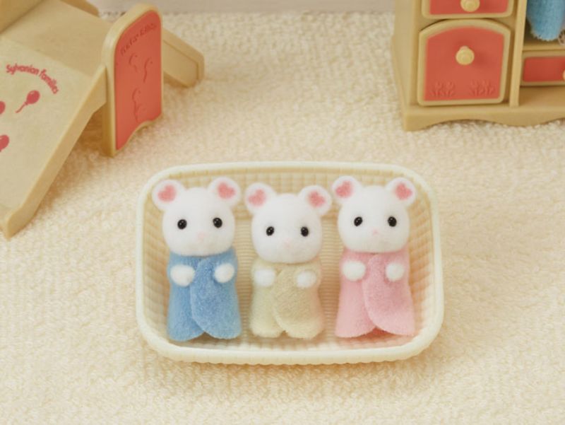 Adorable Marshmallow Mouse Triplets in a cradle, featuring unique flower petal patterns on their ears, perfect for imaginative play.