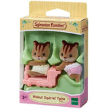 Walnut Squirrel Twins playset featuring sitting and crawling figures with removable clothing and a ride-on toy for imaginative play.