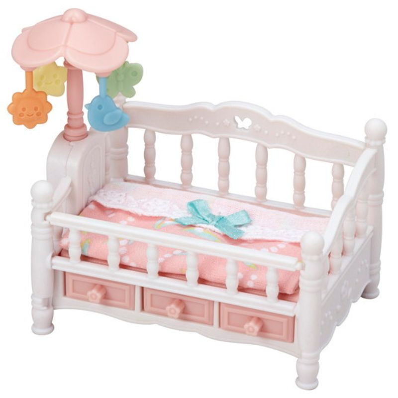 Charming Sylvanian Families crib with mobile, designed for triplet babies, featuring a spinning mobile and versatile bench option.