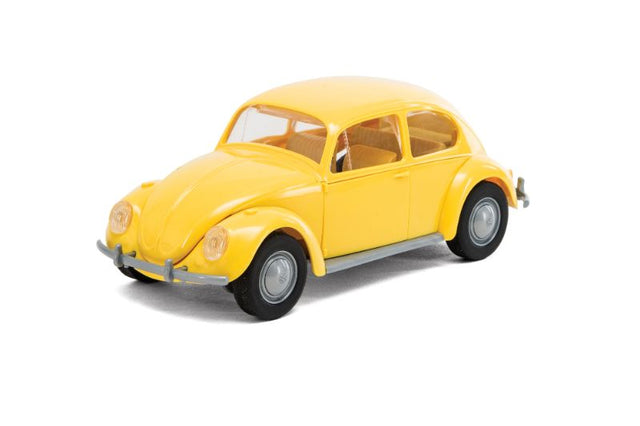 Airfix QUICKBUILD VW Beetle model kit in yellow, easy snap-together pieces for kids and enthusiasts, includes stickers for personalization.