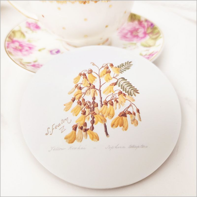 Acrylic coaster featuring Sarah Featon's vibrant Kowhai flower illustration, 10cm, with a cork base for durability.