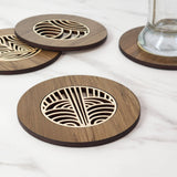 Elegant Art Deco River Rimu coaster, 10cm, handcrafted from reclaimed wood with unique color variations and Pine veneer inlay.