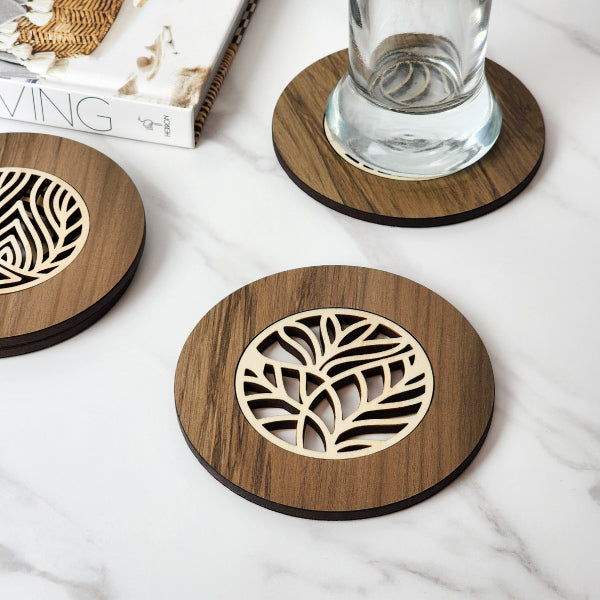 Handcrafted 10cm Rimu coaster from reclaimed NZ timber, showcasing unique colors and natural beauty for stylish surface protection.