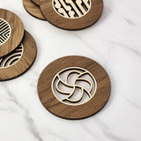 Single Hauora River Rimu coaster, 10cm, showcasing unique reclaimed wood with colorful patterns and eco-friendly craftsmanship.