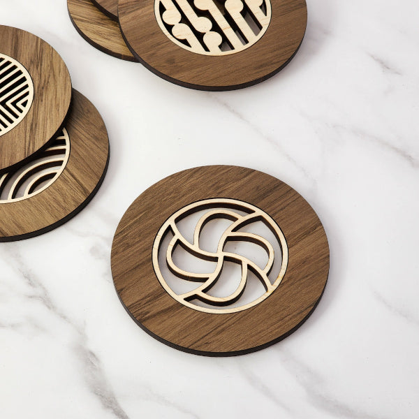 Single Hauora River Rimu coaster, 10cm, showcasing unique reclaimed wood with colorful patterns and eco-friendly craftsmanship.