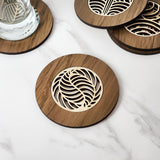 Single Palm River Rimu coaster, 10cm, featuring unique colors from reclaimed NZ Riverwood, blending elegance and functionality.