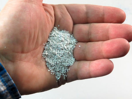 White confetti glitter in a 1kg bag, perfect for adding sparkle to crafts, parties, and events in any themed celebration.