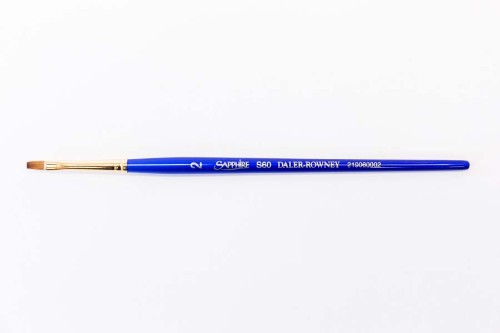 Flat shader brush with red sable and synthetic filaments, ideal for versatile painting in various mediums.