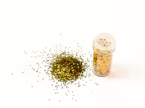 Ultra-fine gold glitter in a 10g package, perfect for crafting, scrapbooking, and adding sparkle to any project.