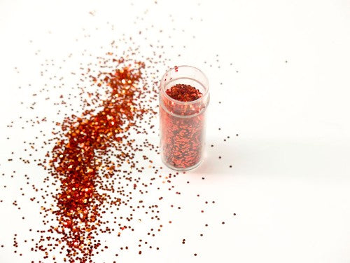 Ultra-fine Marigold glitter in a 10gm container, perfect for card making, scrapbooking, and DIY projects.