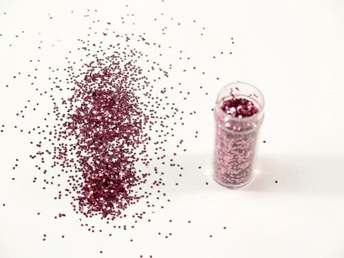 Premium pink glitter in a 10gm pouch, perfect for arts, crafts, and safe for all ages. Ideal for adding sparkle to projects.