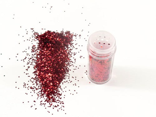 Fine red glitter in a 10g pack, perfect for adding sparkle to arts and crafts projects and festive decorations.