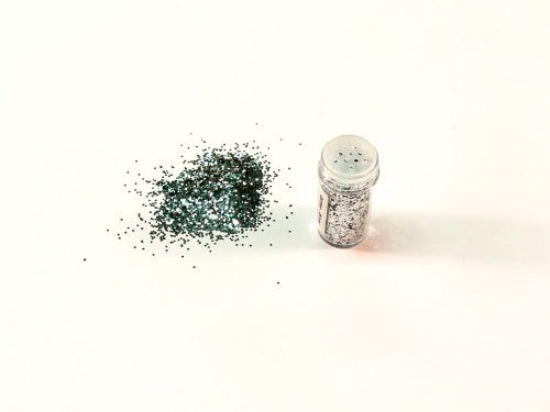 Shimmering silver glitter in a 10gm pack, perfect for crafts, DIY projects, and adding sparkle to decorations.