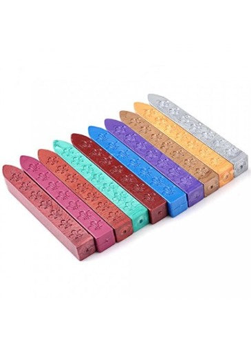 Elegant silver sealing wax display with wick for easy use, perfect for crafting and personal correspondence.