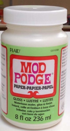 Paper Mod Podge Gloss 8oz bottle for crafting, ideal for card making, scrapbooking, and achieving a glossy finish.