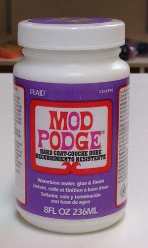 Mod Podge Hard Coat 8oz bottle for durable, clear finish on furniture and crafts, ideal for DIY and professional projects.