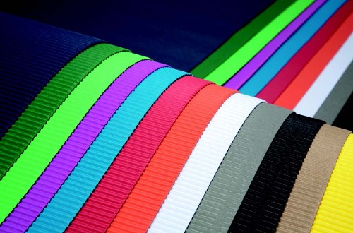 Premium white corrugated card, durable and water-resistant, perfect for crafts and artwork, available in 50x70 sheets.