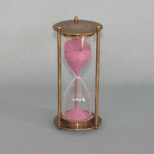 Elegant 3-minute brass sand timer, 10 x 5 cm, ideal for home decor and practical timing needs. Perfect gift or statement piece.