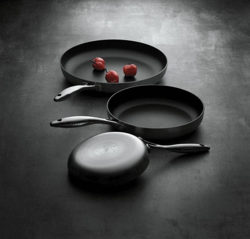 Scanpan 2 Piece Fry Pan Set featuring Stratanium+ nonstick technology, clad aluminum construction, and elegant stainless steel exterior.