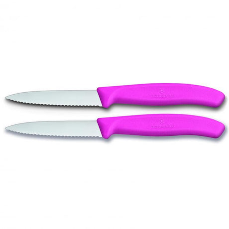 Set of 2 Victorinox paring knives with pointed tips and wavy edges for precision in peeling, slicing, and garnishing tasks.