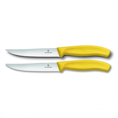 Set of 2 Victorinox steak and pizza knives with wide wavy blades and ergonomic handles for effortless cutting.