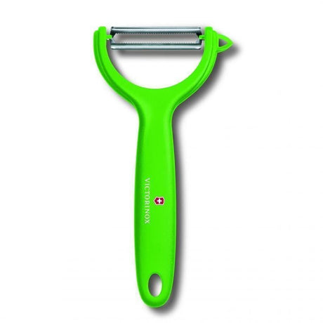 Green Victorinox Tomato Kiwi Peeler with micro-serrated double edge, ideal for peeling fruits effortlessly.