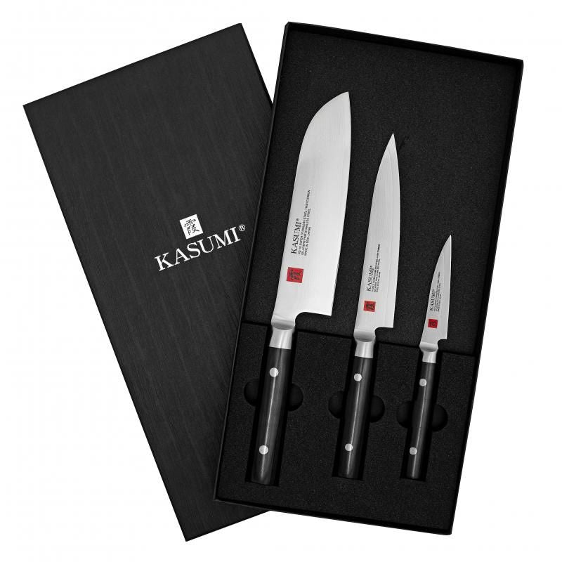 Kasumi 3 Piece Santoku Set featuring high-carbon stainless steel knives with elegant Damascus patterns and robust wooden handles.