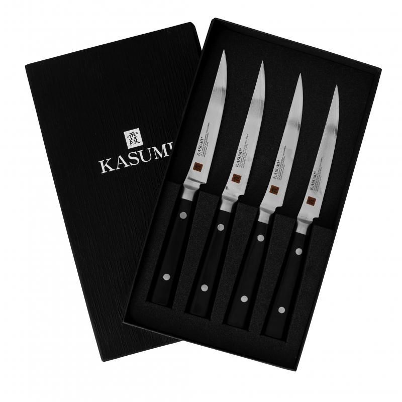 Kasumi 4-piece steak knife set featuring VG-10 core, Damascus steel, and ergonomic pakka wood handles, perfect for culinary tasks.