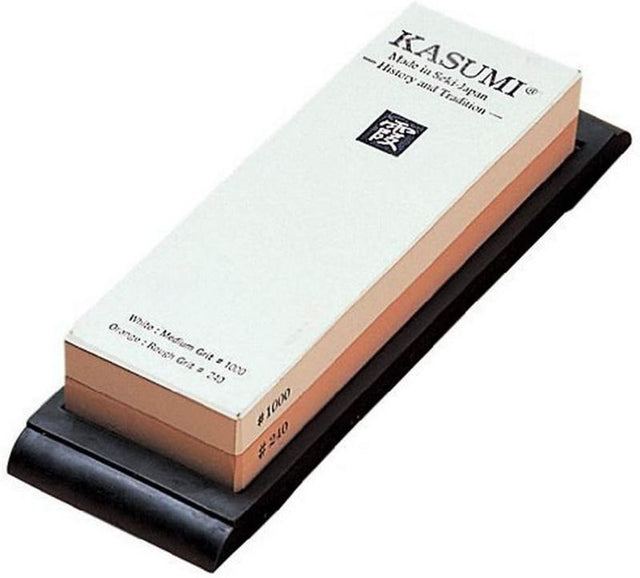 Kasumi Combination Whetstone featuring coarse grit (2000) and fine grit (6000) for precise knife sharpening.