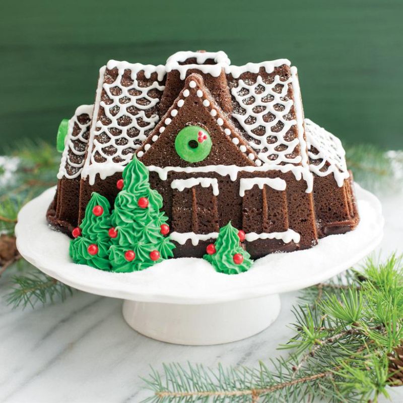 Nordic Ware Gingerbread House Bundt® Pan, perfect for festive baking with durable cast aluminum and 9 cup capacity.