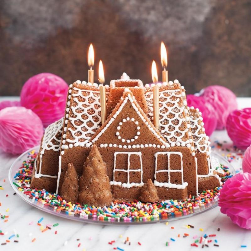 Nordic Ware Gingerbread House Bundt Pan for festive baking, featuring a 9-cup capacity and intricate gingerbread house design.