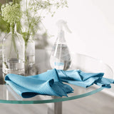 Clear E-Cloth water spray bottle with adjustable nozzle, holding 17.5 oz for easy cleaning with microfiber cloths.