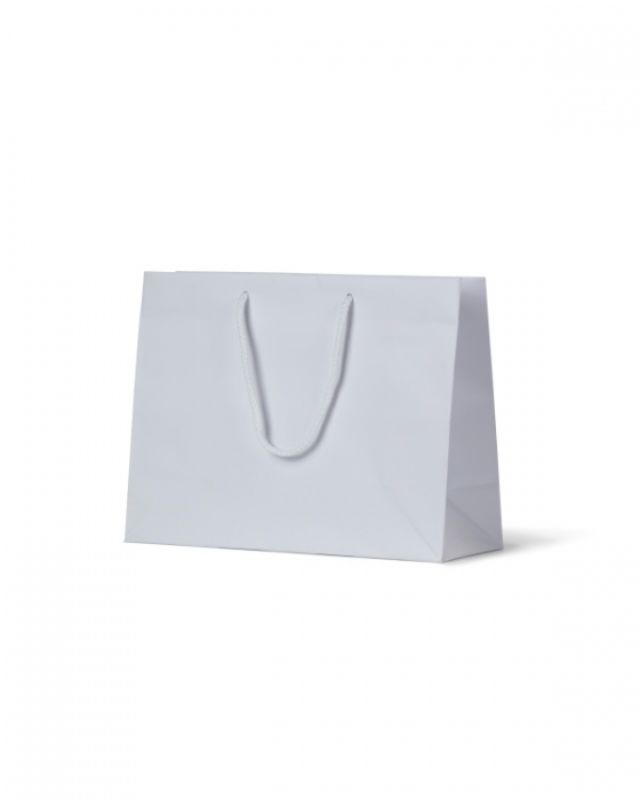 Laminated matte ruby and white bags with rope handles, ideal for packaging apparel and small tech items in a stylish way.
