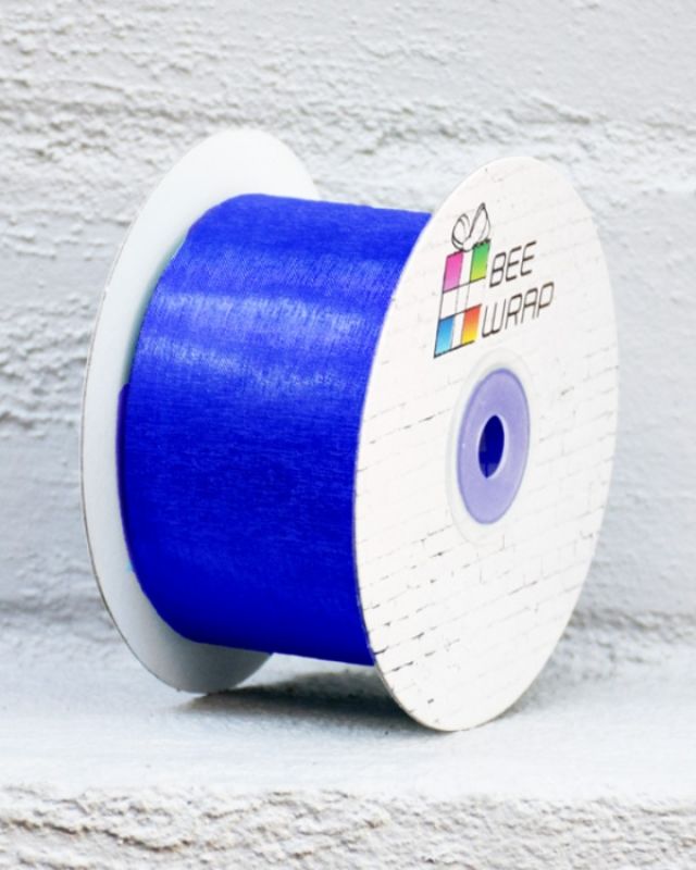 Royal blue cut edge organza ribbon, 50mm wide and 50m long, perfect for elegant gifting and DIY projects.