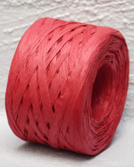 Vibrant red Paper Raffia ribbon, 4mm wide and 100m long, perfect for crafting, gift wrapping, and floral arrangements.