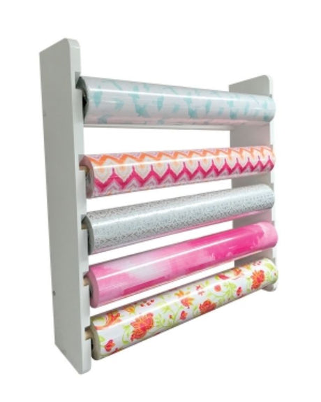 Stylish white wooden wall-mounted wrap dispenser for organizing multiple rolls of wrapping paper and ribbon.