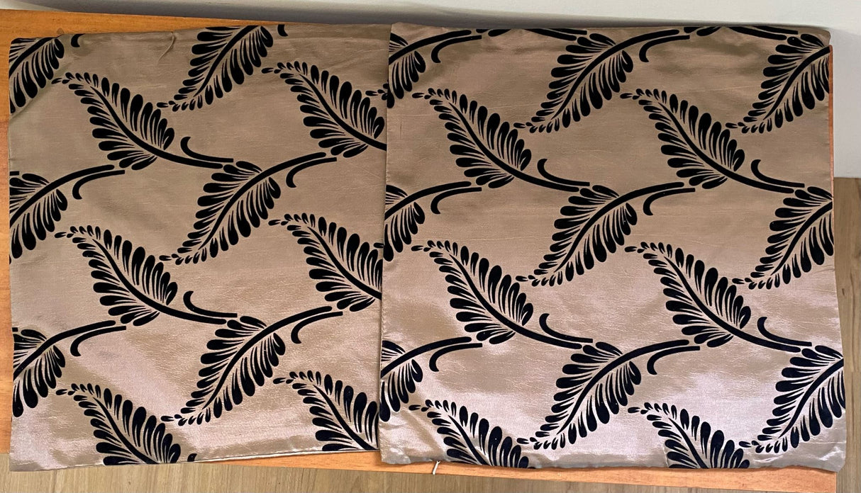 Set of 6 bronze cushion covers with black fern pattern, featuring luxe satinee fabric and zip for easy washing.