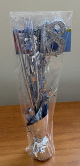 Elegant silver table weight for 18th birthday parties, enhancing decor and keeping decorations in place.
