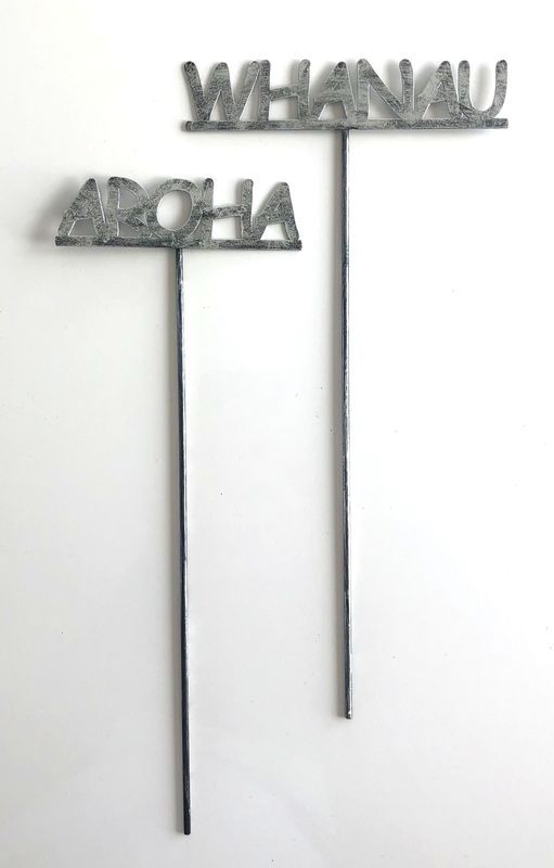 Elegant silver and black garden sticks set of 24 for marking plants in style and enhancing garden aesthetics.