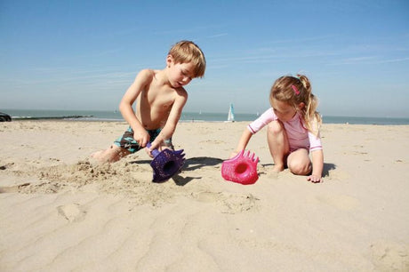 Vibrant green Triplet Shovel/Rake set of 2 for kids, combining shovel, rake, and sifter for creative outdoor play.