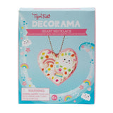 Colorful DIY heart necklace kit for kids, including felt hearts, Deco Cream, sprinkles, and charms for personalized jewelry.