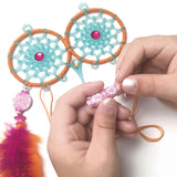 Owl-shaped dreamcatchers with glow-in-the-dark eyes, feathers, threads, and beads for enchanting decor and sweet dreams.