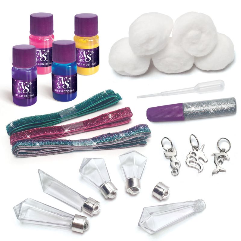 Crystal Wish Keepers Kit featuring 5 crystal-shaped bottles, glitter, vibrant inks, charms, and crafting accessories for creative fun.