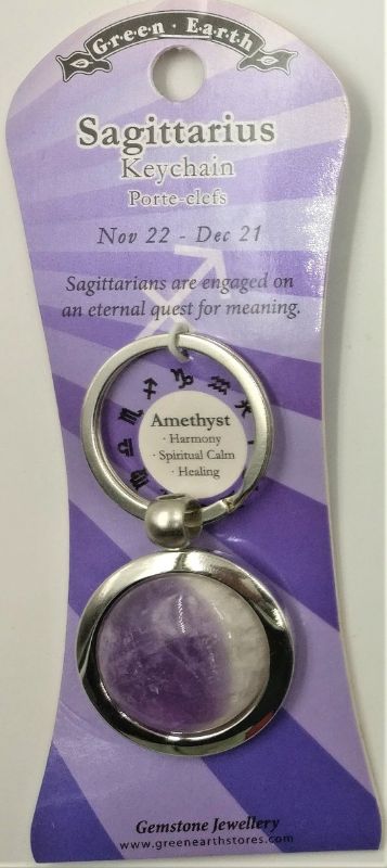 Set of 6 Sagittarius amethyst keyrings on display card, combining stylish design with astrological inspiration.