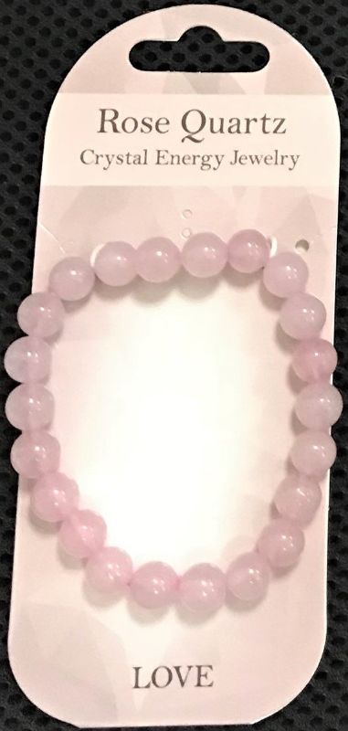 Set of 3 elegant rose quartz bracelets with 8mm beads, promoting love, healing, and stylish layering.