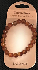 Set of three bracelets featuring 8mm vibrant orange-red Carnelian beads, known for their beauty and healing properties.