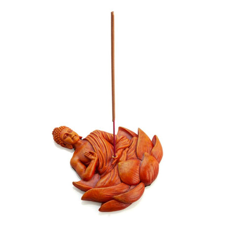 Incense burner featuring an orange Buddha on a lotus, made of natural pale stone, ideal for meditation and home decor.